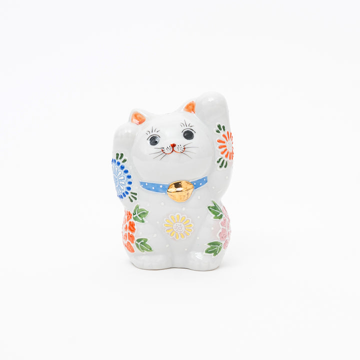 Decorative cat figurine with colorful patterns on a white background