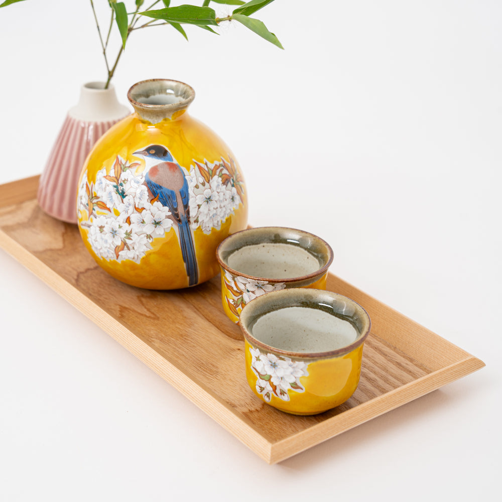 Kutani Ware sake bottle (tokkuri) with Yoshidaya cherry blossom design