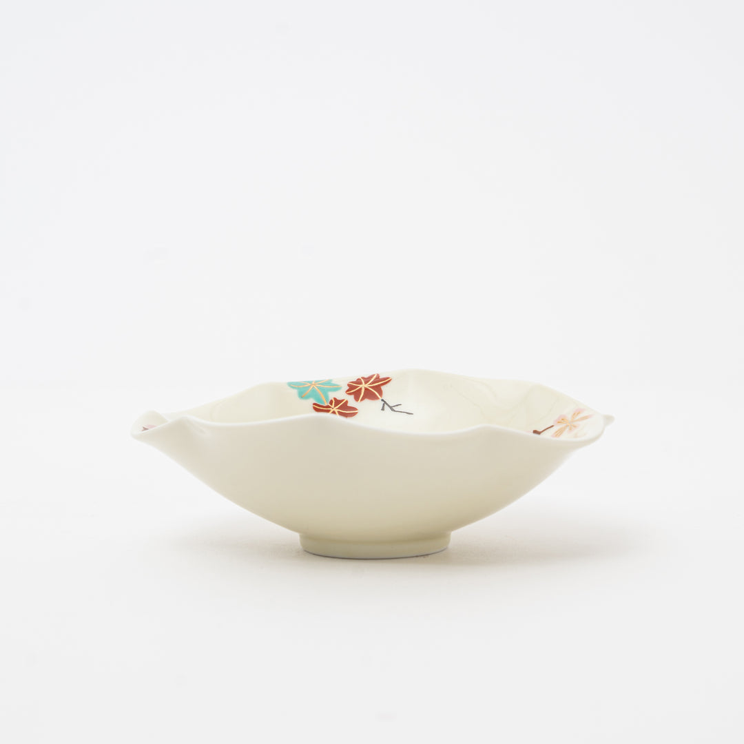 Handmade Arita Ware bowl with a delicate scalloped shape and a hand-painted floral design in red, blue, and pink.