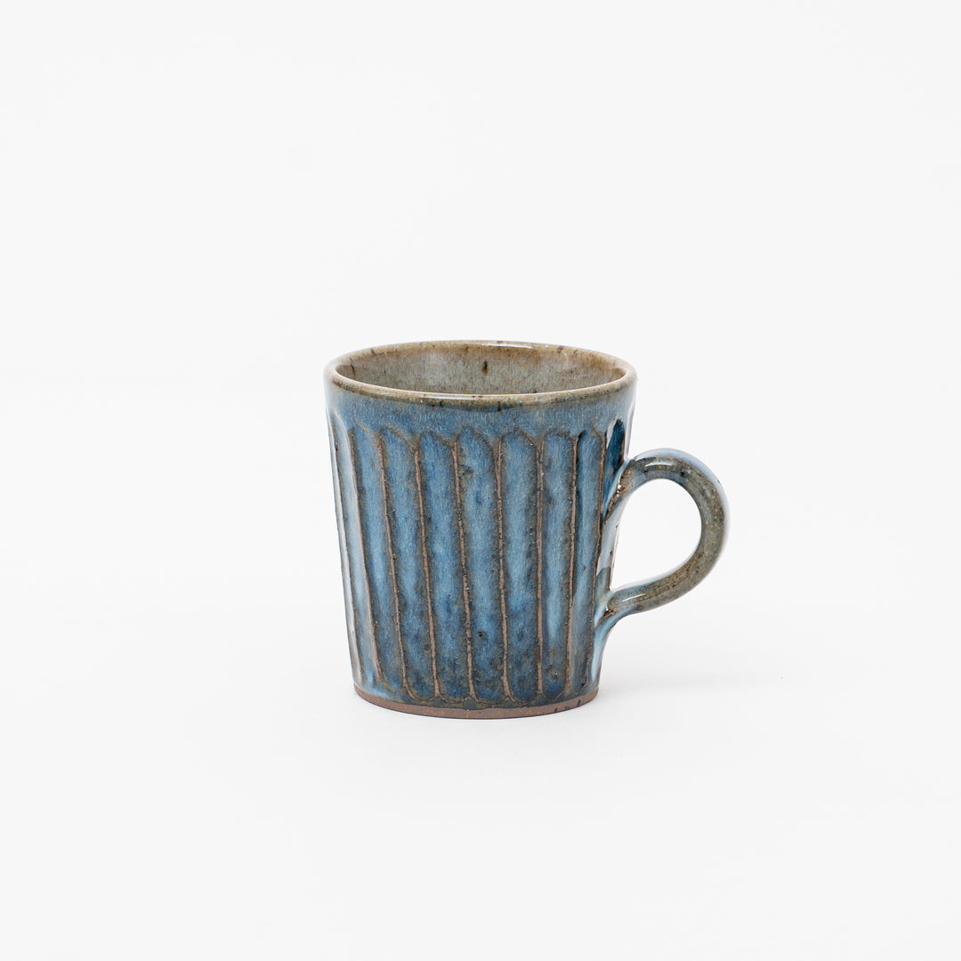 Japanese Shigaraki Ware ceramic mug in blue with vertical ridges, approx 330ml capacity