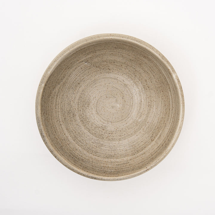 Handmade Japanese bowl with a unique hand-twisted design