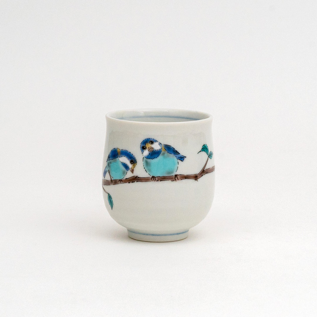 Hand-painted Kutani Ware Japanese ceramic tea cup (yunomi) with a single blue bird on a branch.