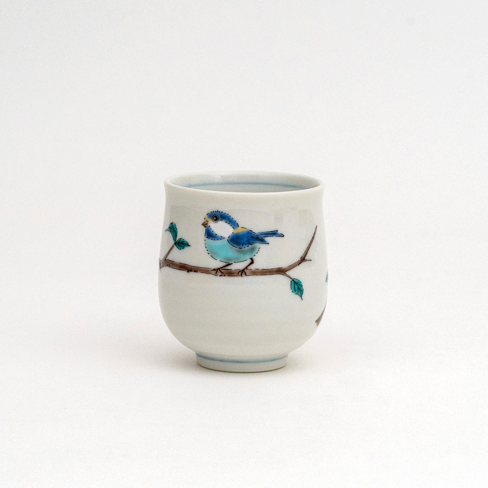 Hand-painted Kutani Ware Japanese ceramic tea cup (yunomi) with two blue birds on a branch.