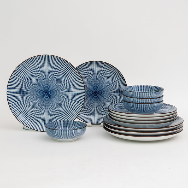 Japanese Tokusa blue stripe dinnerware collection featuring Mino Ware porcelain plates and bowls with radiating stripe pattern