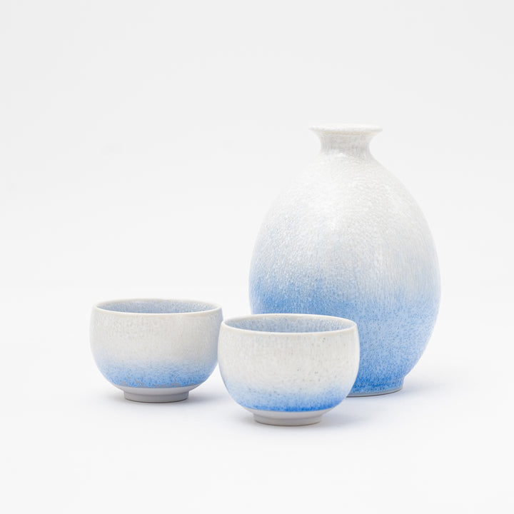 Arita porcelain guinomi sake cups with blue mist glaze