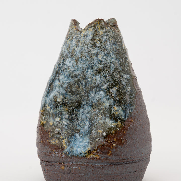 Close-up of mottled blue-gray glaze on Shigaraki mini vase