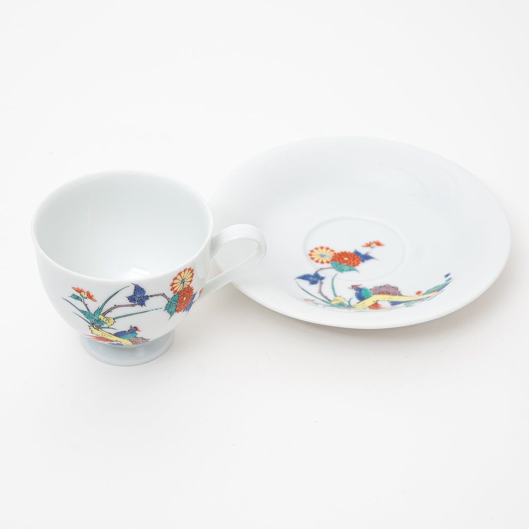 Arita Ware cup and saucer set from Japan, highlighting the colorful hand-painted branches, birds, and flowers