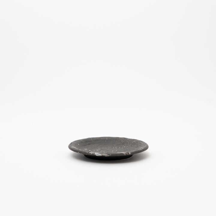 Japanese Mino Ware rough black ceramic plate with white speckles, approx 14.2cm diameter, for appetizers or unique dishes