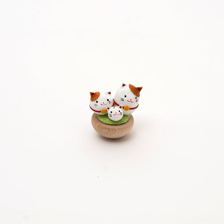 Small Japanese lucky cat figurine, Ryukodo mini daruma wobble toy with three cats design