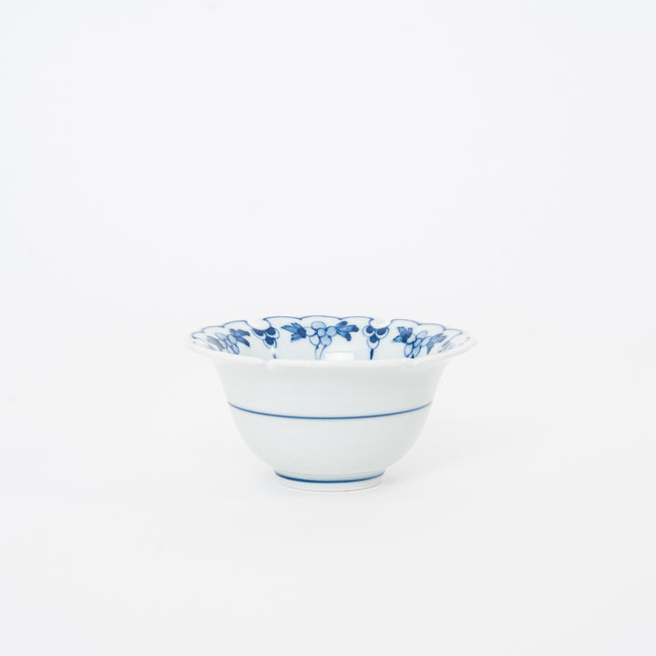 Side profile of a 3.75 inch Japanese porcelain mini bowl showing the elegant tapered shape and blue striped base design.