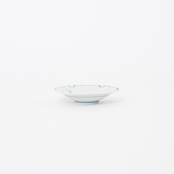 Side view of Hasami-yaki porcelain sauce plate showing 1.7cm height and scalloped rinka edge