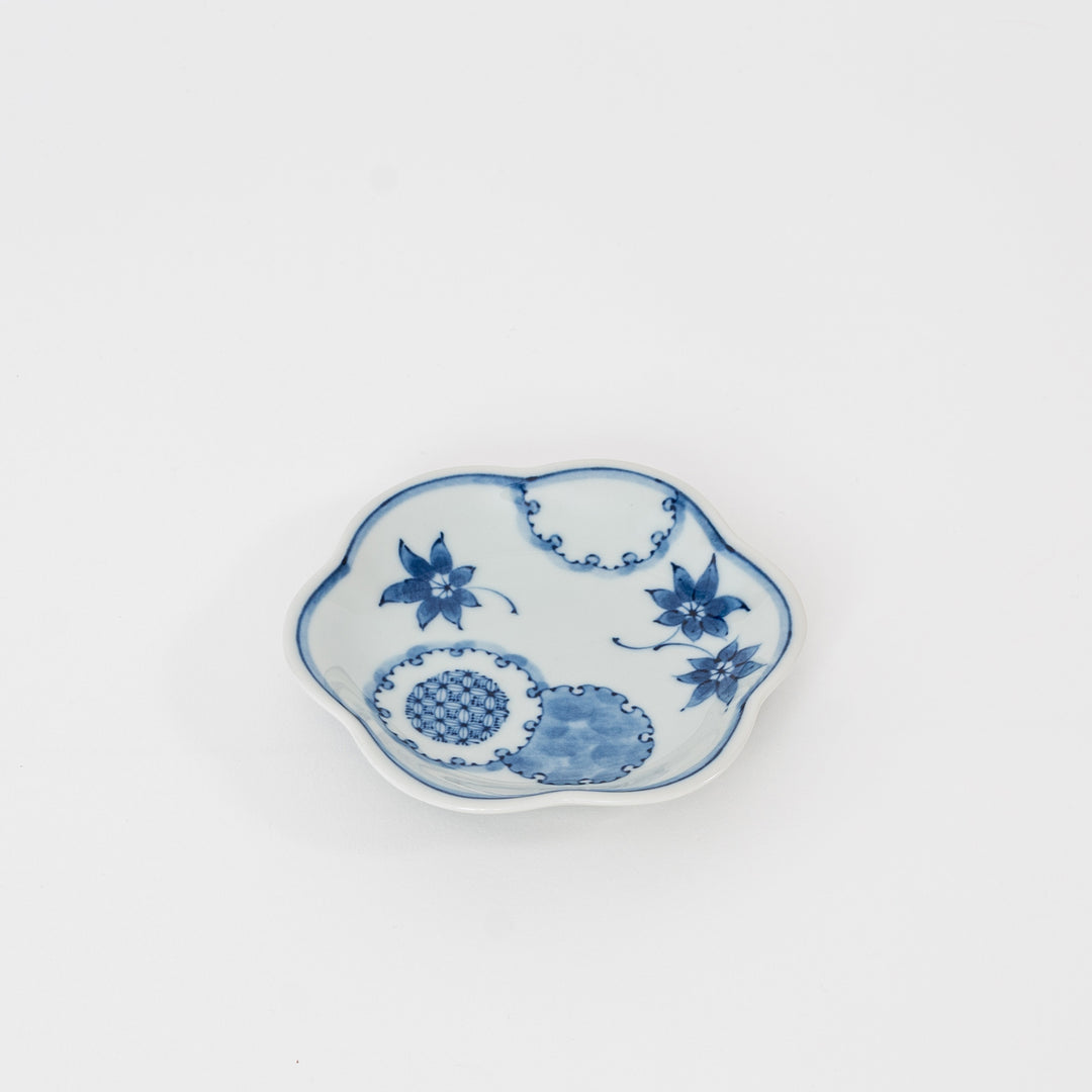 op view of Japanese Hasami Ware porcelain plate with indigo floral pattern and scalloped rim, available at Great Zakka, Great Neck, NY.