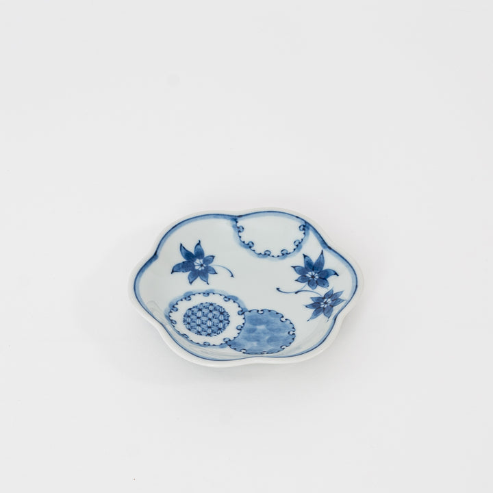 op view of Japanese Hasami Ware porcelain plate with indigo floral pattern and scalloped rim, available at Great Zakka, Great Neck, NY.
