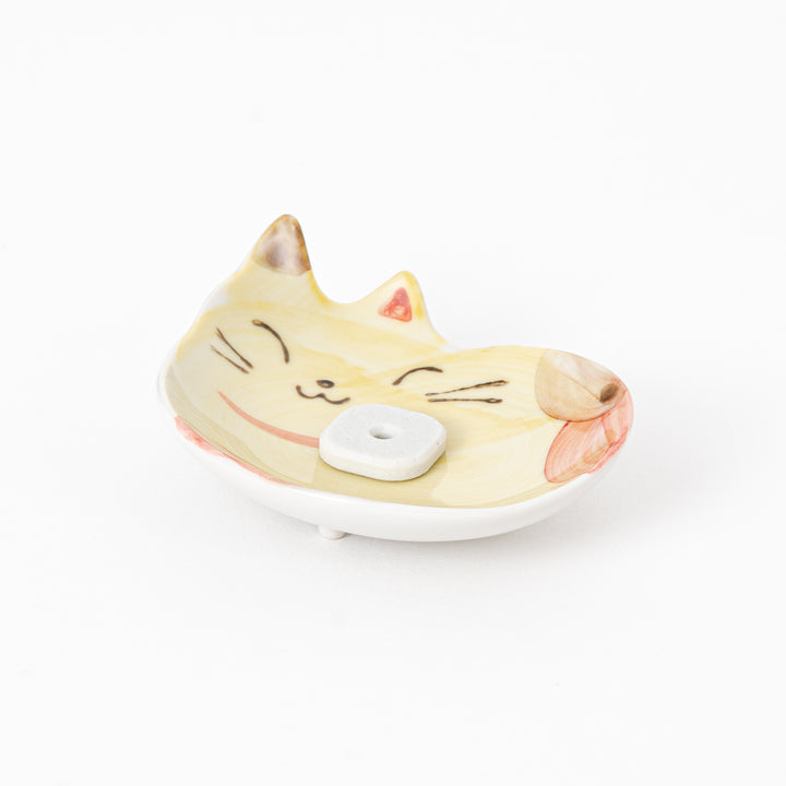 Cat-shaped soap dish on a white background