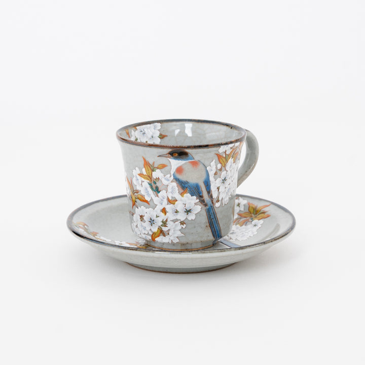 Hand-painted Kutani ware teacup and saucer with bird and cherry blossom design, Japanese ceramic tea cup set