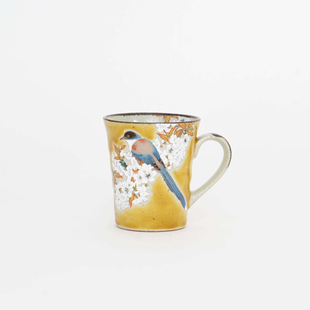 Kutani Yoshidaya style mug with hand-painted bird and cherry blossom design, yellow glaze Japanese porcelain cup