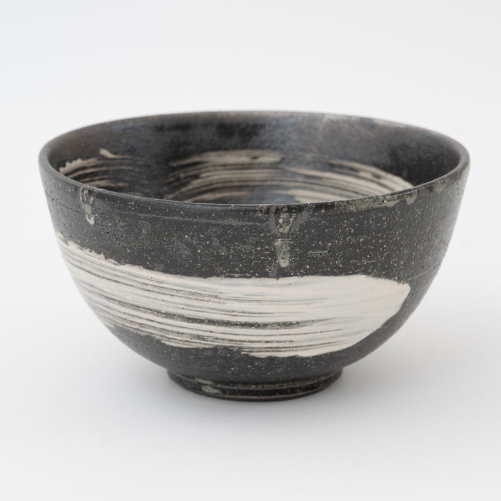 Black and white ceramic bowl on a white background