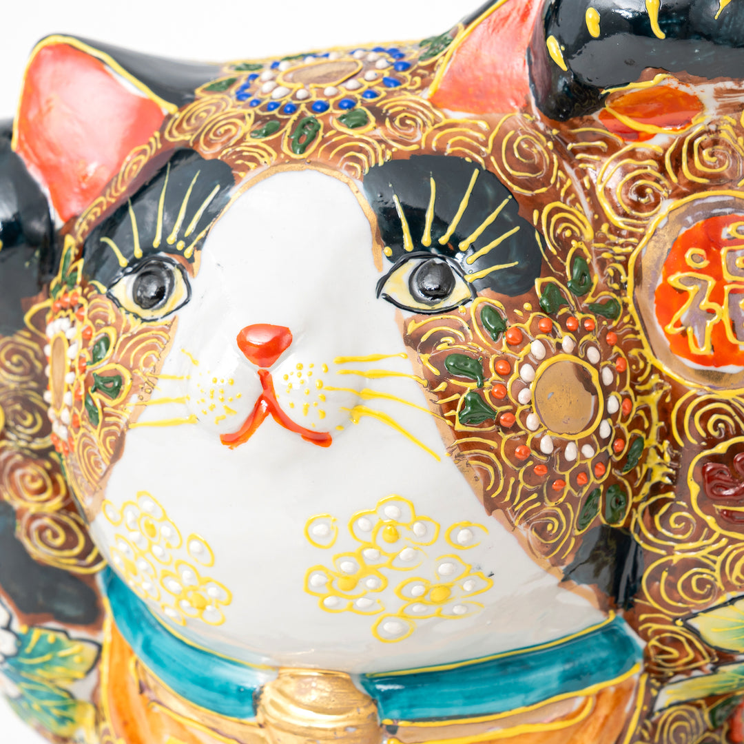 Decorative Lucky cat figurine with intricate designs and colors