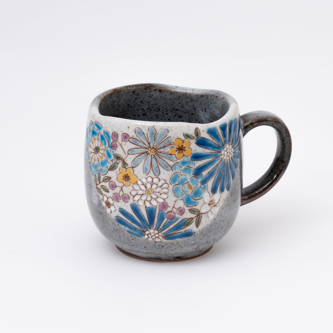 Hand-painted Blue Kutani Ware ceramic mug featuring intricate floral artwork and gold detailing