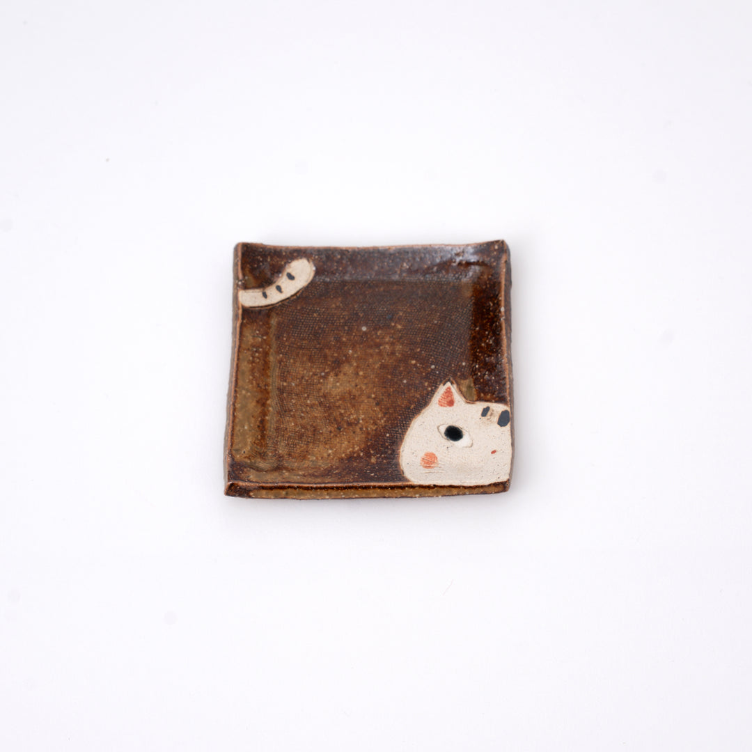 Handmade Japanese peeking cat mini dish in brown ceramic with striped tail