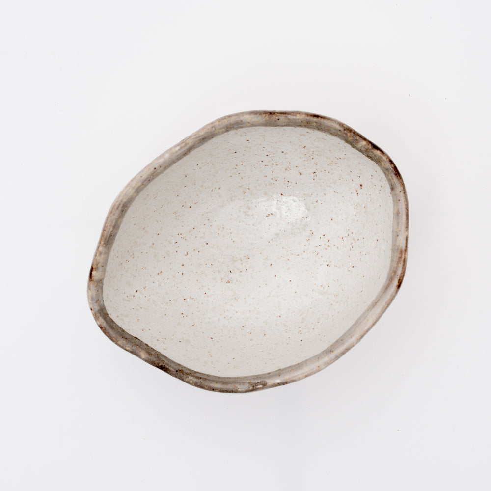 Handmade oval white Karatsu Yaki bowl with a narrow brown rim