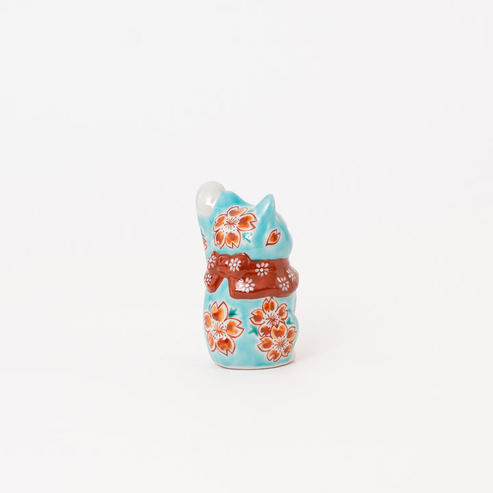 Back view of a hand-painted Japanese Kutani Lucky Cat (Maneki Neko) porcelain figurine made in Japan.
