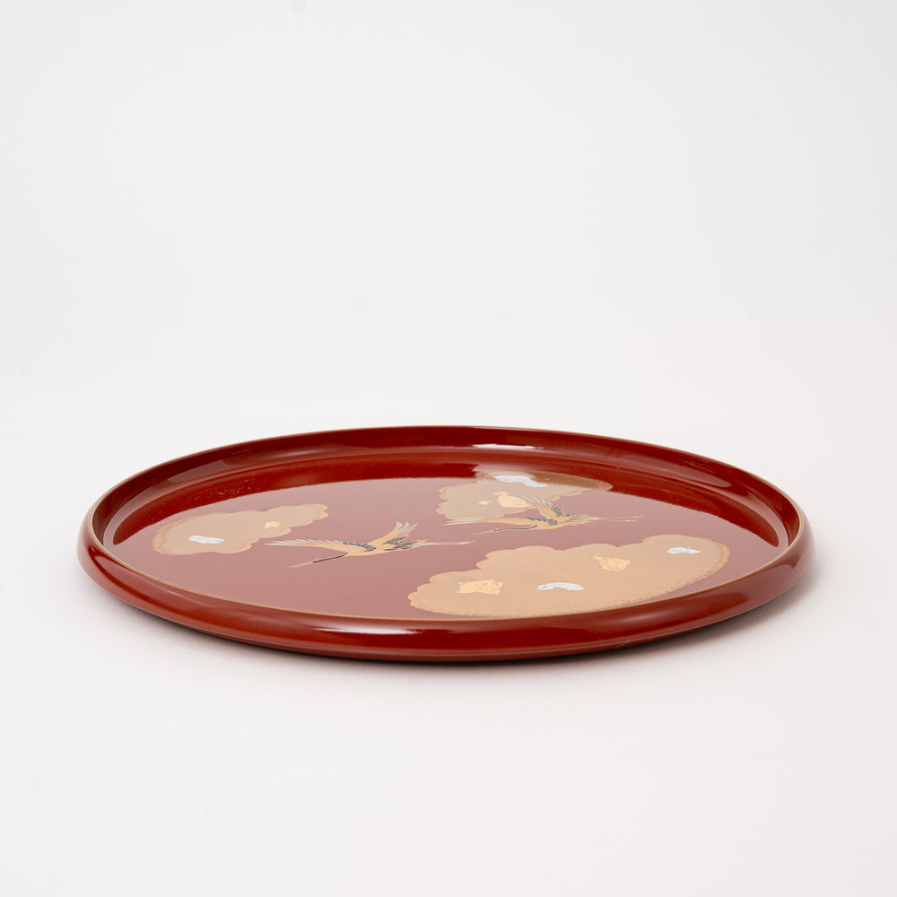 Traditional Japanese red lacquer tray with crane design