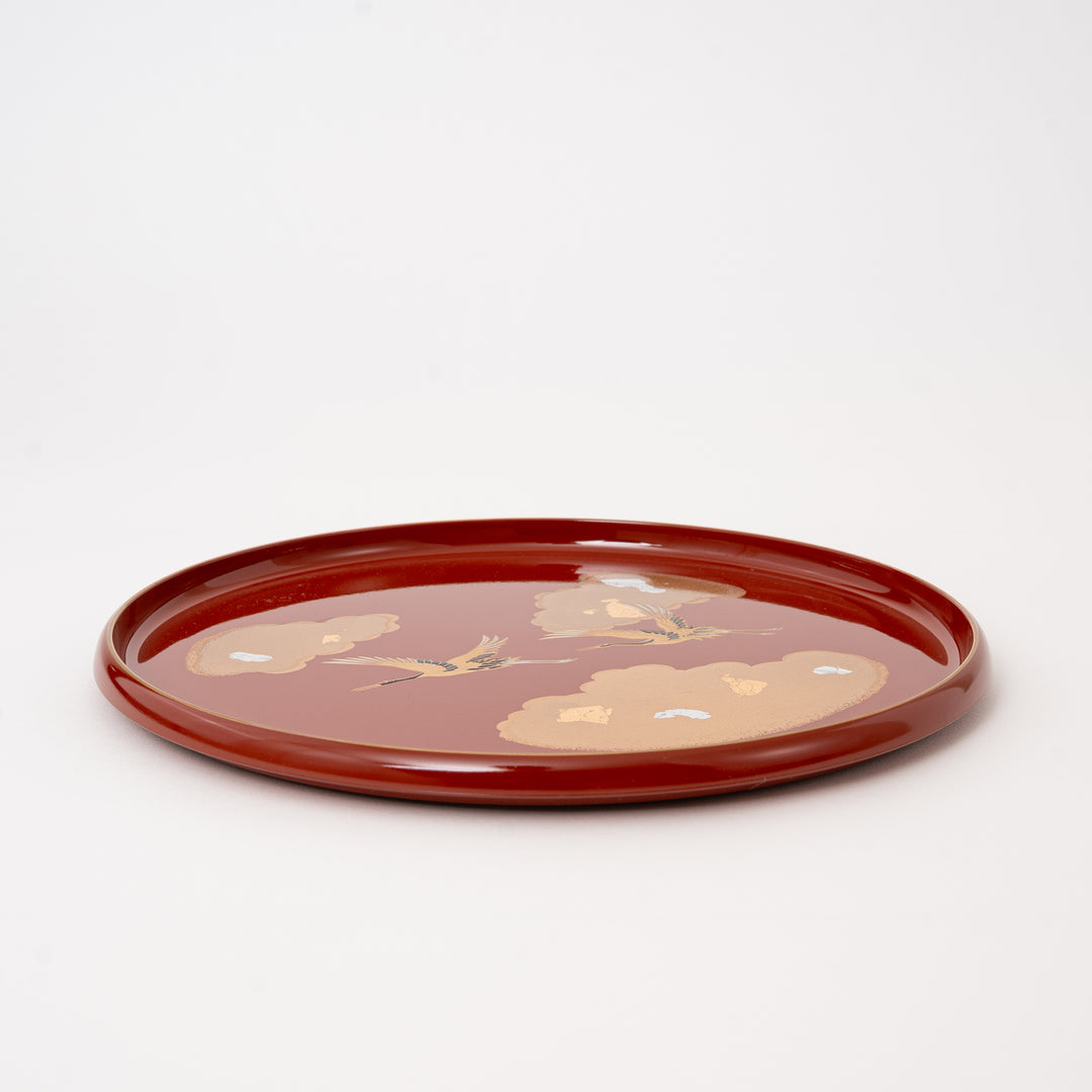 Traditional Japanese red lacquer tray with crane design