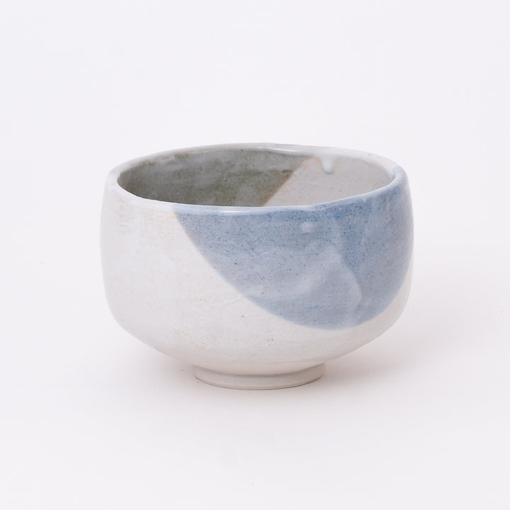 Front view of a handcrafted Mino Ware Mist Blue matcha bowl with soft blue-gray glaze