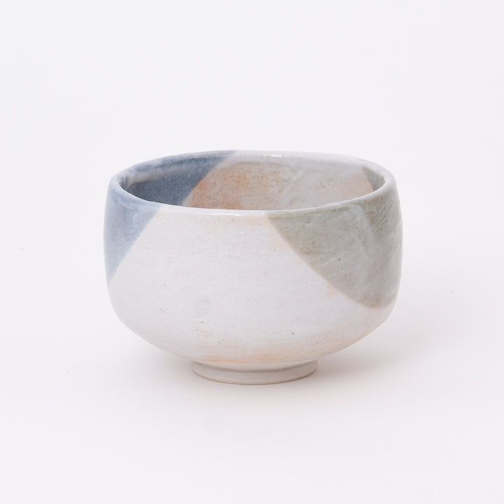 Side view of a handmade Japanese Mist Blue ceramic matcha bowl