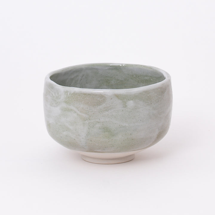 Handcrafted Japanese Mino Ware Green Shino Matcha Bowl with a soft sage green glaze, made in Japan.