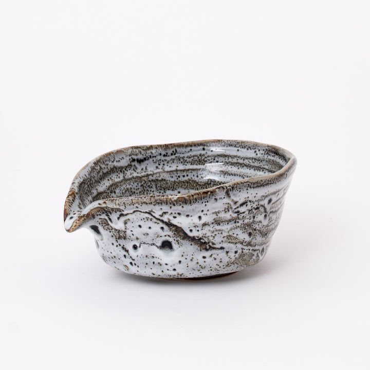 Handcrafted Japanese Mino Ware Flowing Glaze Katakuchi Matcha Bowl with a flowing white glaze and traditional pouring spout, made in Japan.