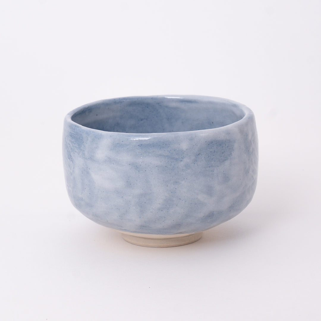Front view of a Japanese Mino Ware Ao Shino Matcha Bowl featuring a soft blue and white glaze.