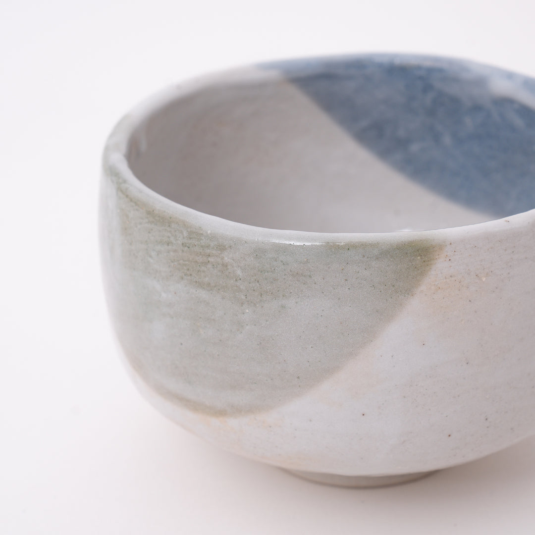 Close-up of the soft Mist Blue glaze on a handcrafted Japanese Mino Ware matcha bowl