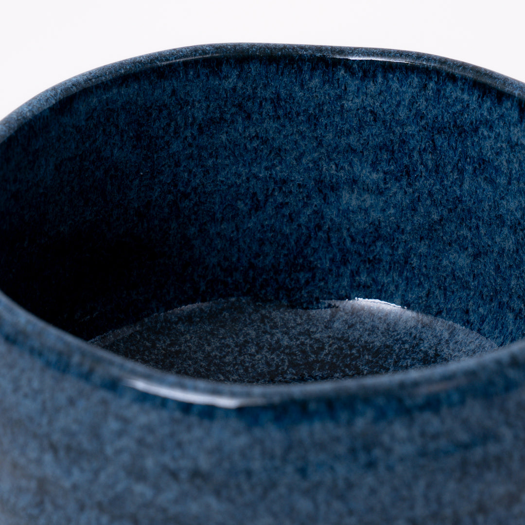 Close-up of the glossy Blue Ruri glaze on a handcrafted Japanese Mino Ware chawan