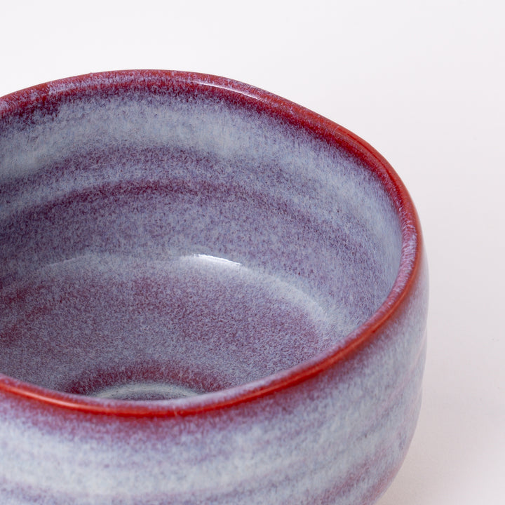 Front view of a Japanese Mino Ware Sakura Unofu Matcha Bowl featuring a delicate pink gradient glaze.