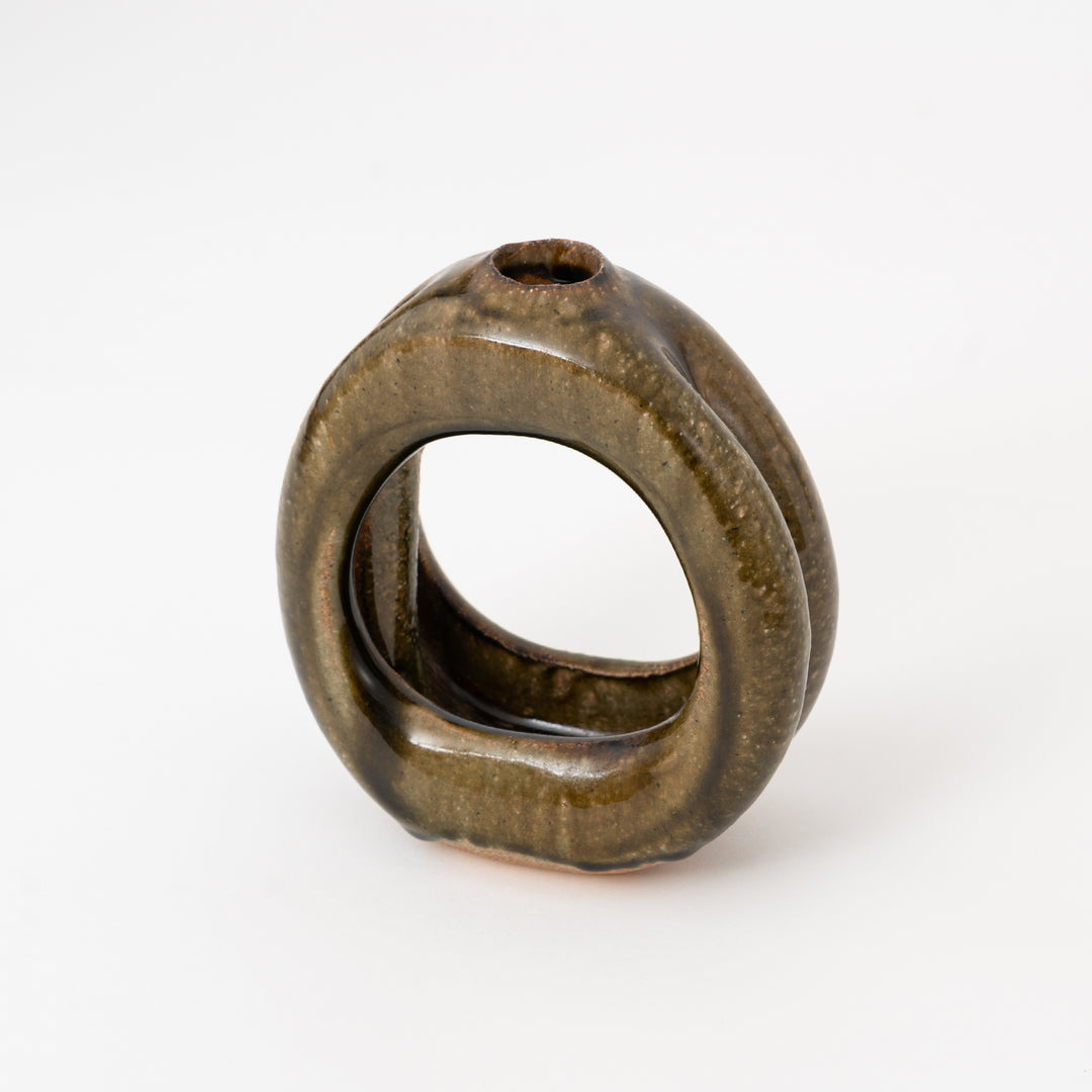 Angled view of olive brown Shigaraki sculptural Japanese pottery vase