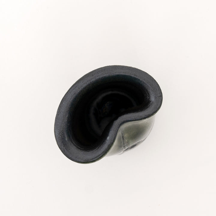 Curved organic rim detail of olive green Shigaraki mini vase