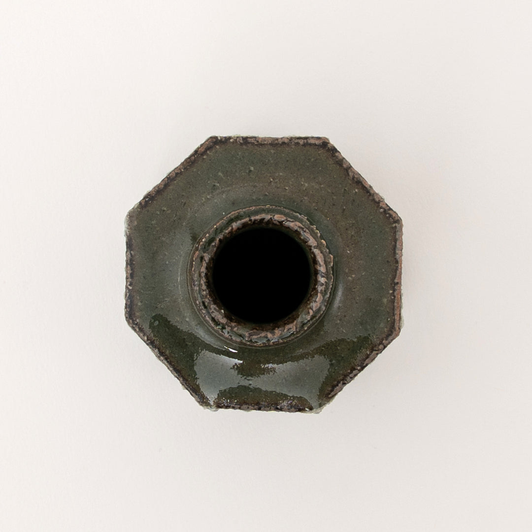 Top detail of green glazed Shigaraki mini vase with small flower opening