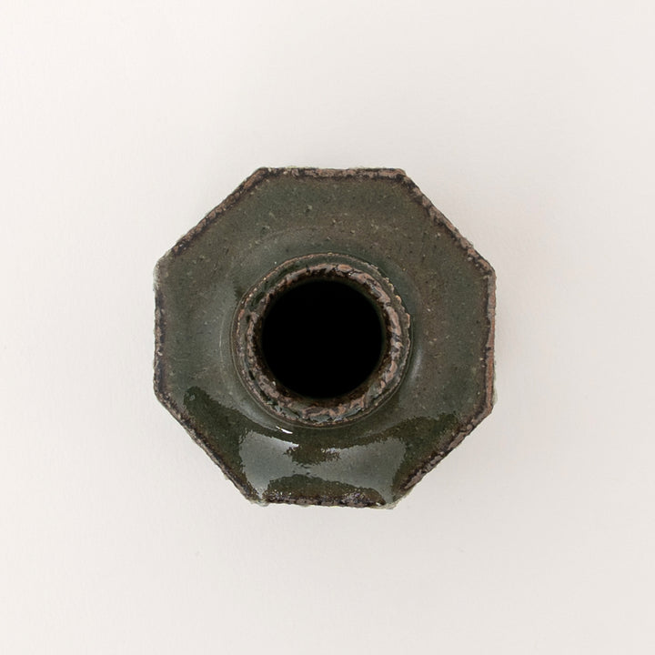 Top detail of green glazed Shigaraki mini vase with small flower opening