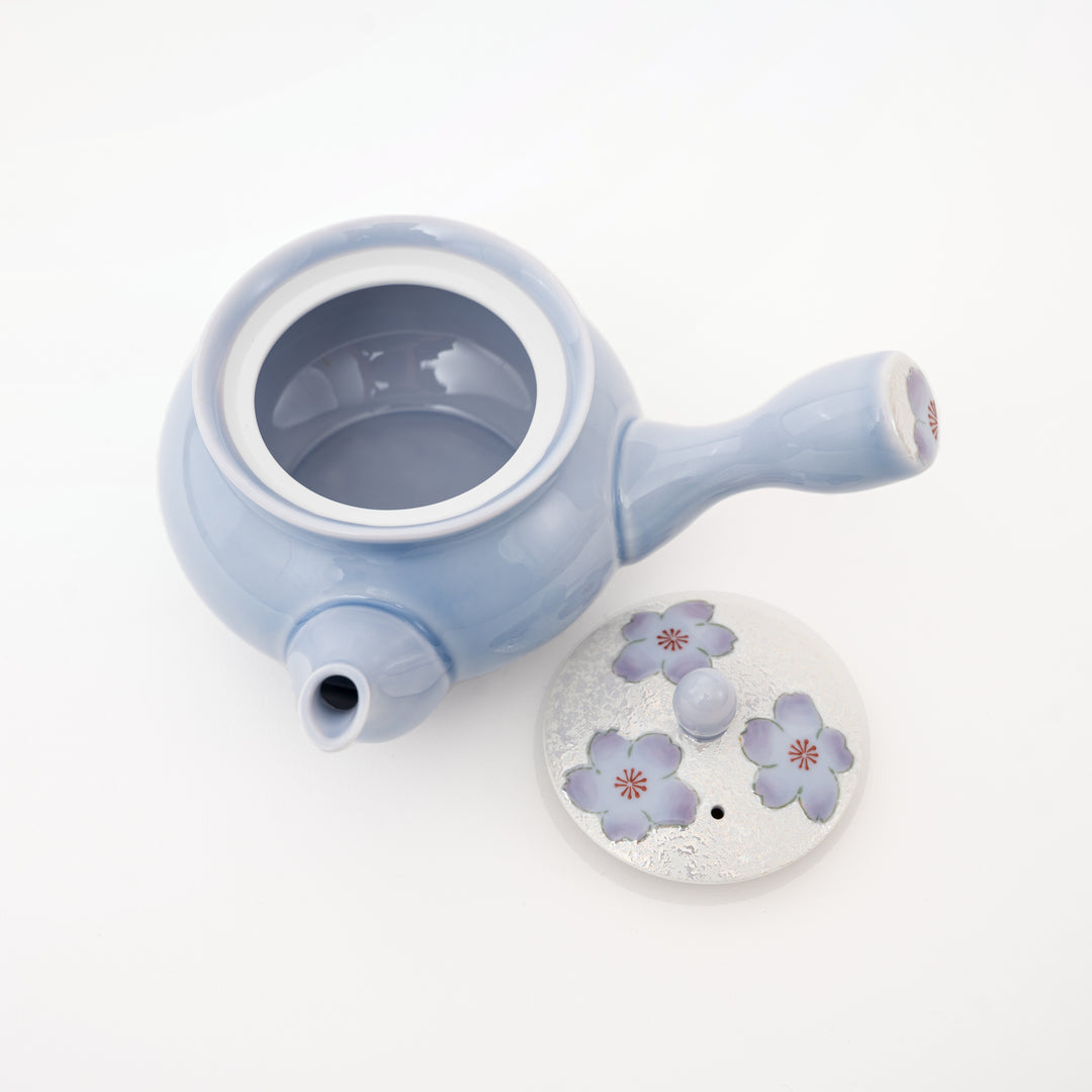 Japanese lilac pottery teapot with gently warped silhouette