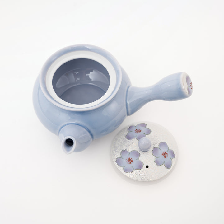 Japanese lilac pottery teapot with gently warped silhouette