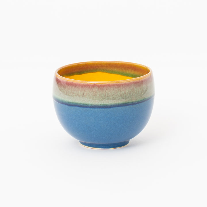 Japanese blue glazed matcha bowl with warm yellow interior TY1428