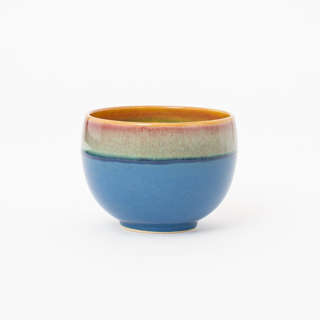 Blue exterior yellow interior Japanese ceramic matcha tea bowl