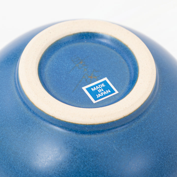 Blue and warm yellow Japanese matcha bowl detail