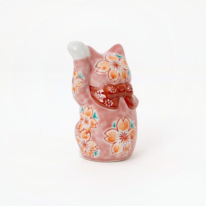 Pink glazed Kutani lucky cat porcelain figurine side angle
