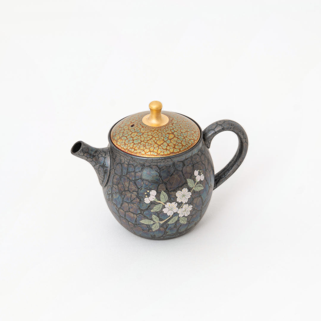 Dark Tenmoku glaze and elegant gold finish on Shoryu teapot lid