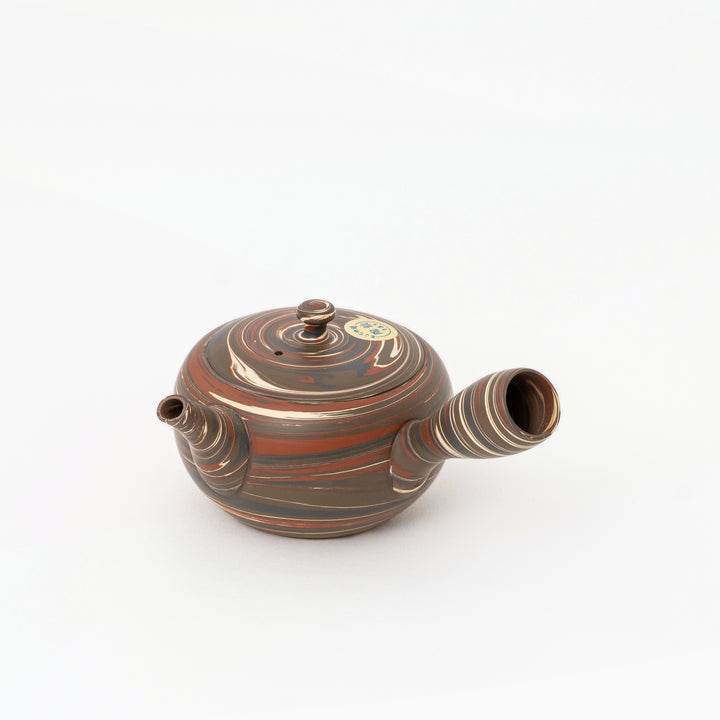 Traditional Tokoname twisted-clay nerikomi texture on kyusu teapot