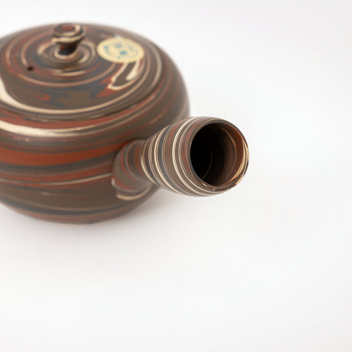 Natural reddish-brown blended clay pattern on Japanese Tokoname kyusu