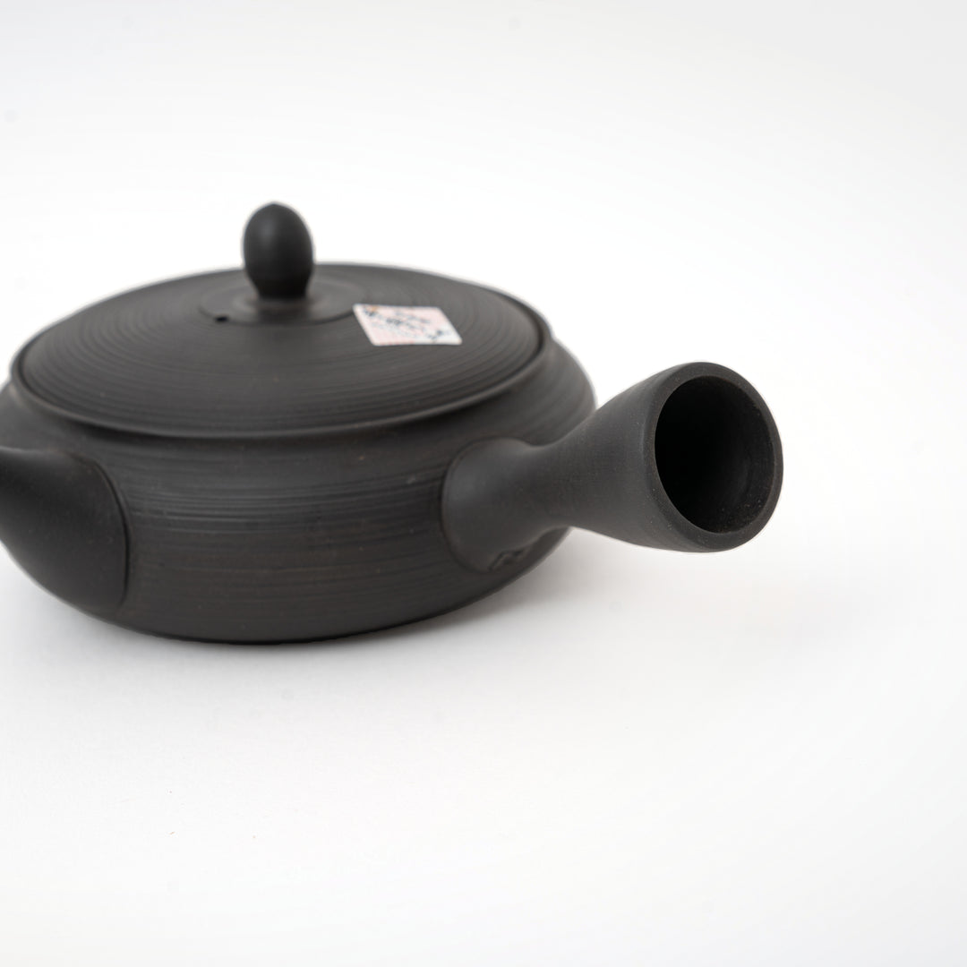 Tokoname black kiln-variation flat teapot from Gyokko Kiln